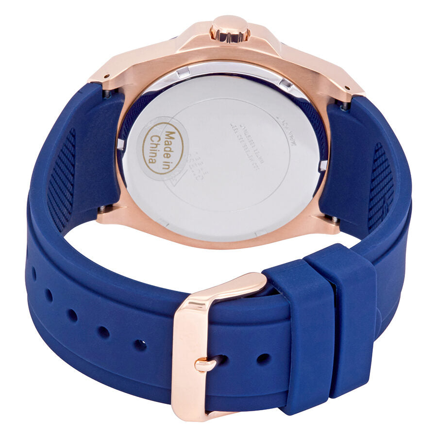 Guess Legacy watch caseback showing stainless steel with Guess branding and blue silicone strap