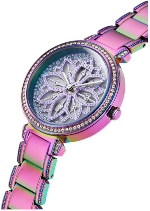 Close-up of Guess Lily dial showing iridescent surface with crystal bezel and colored bracelet