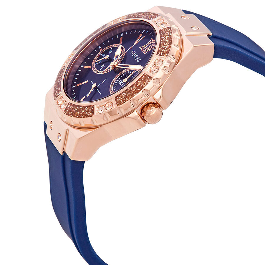 Side angle view of Guess Limelight watch showing rose gold case and navy silicone strap