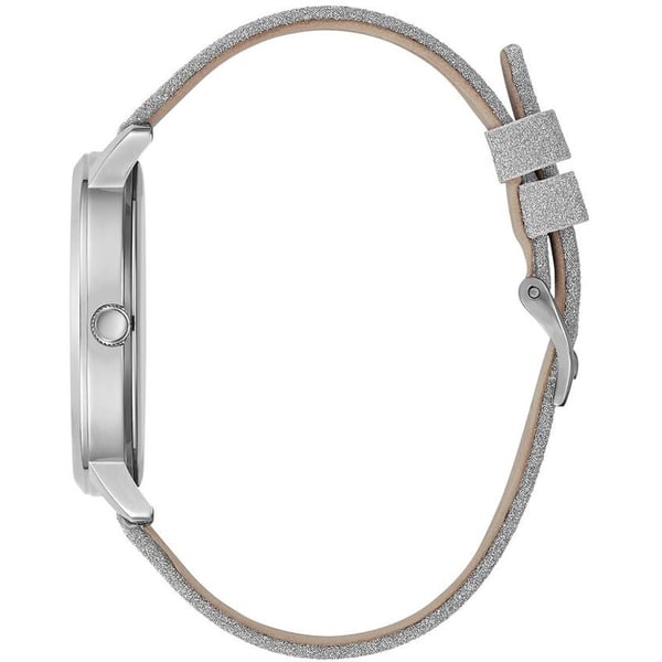 Side view of Guess Mariposa watch showing silver-tone case profile and glitter strap