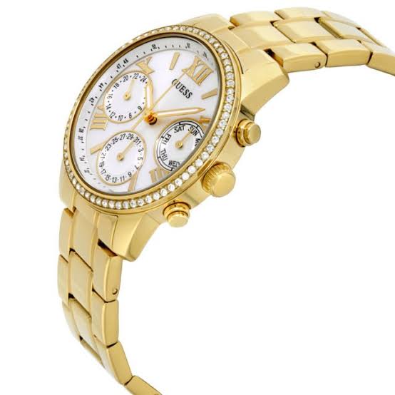 Side angle of Guess Mini Sunrise gold watch with white chronograph dial and diamond bezel