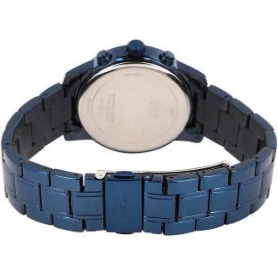 Guess Mini Sunrise caseback view showing engraved blue metal case back and bracelet
