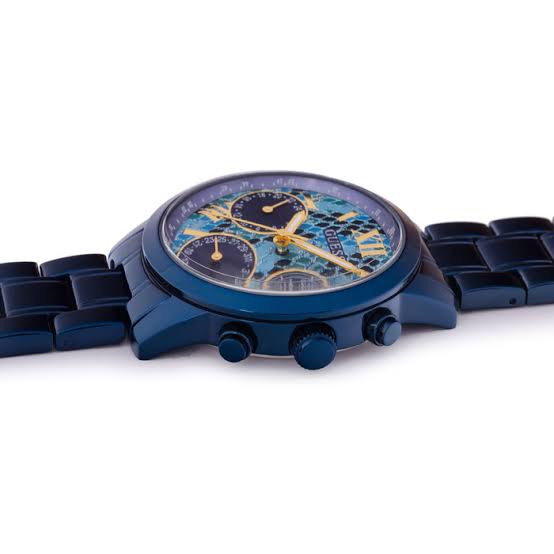 Close-up of Guess Mini Sunrise blue dial featuring multi-function chronograph subdials and Roman numerals