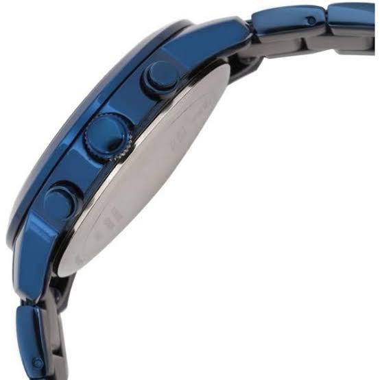 Side profile of Guess Mini Sunrise watch showing blue case, chronograph pushers and blue bracelet