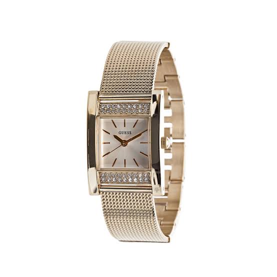 Guess Nouveau ladies watch angled view showing gold mesh bracelet and diamond-set case