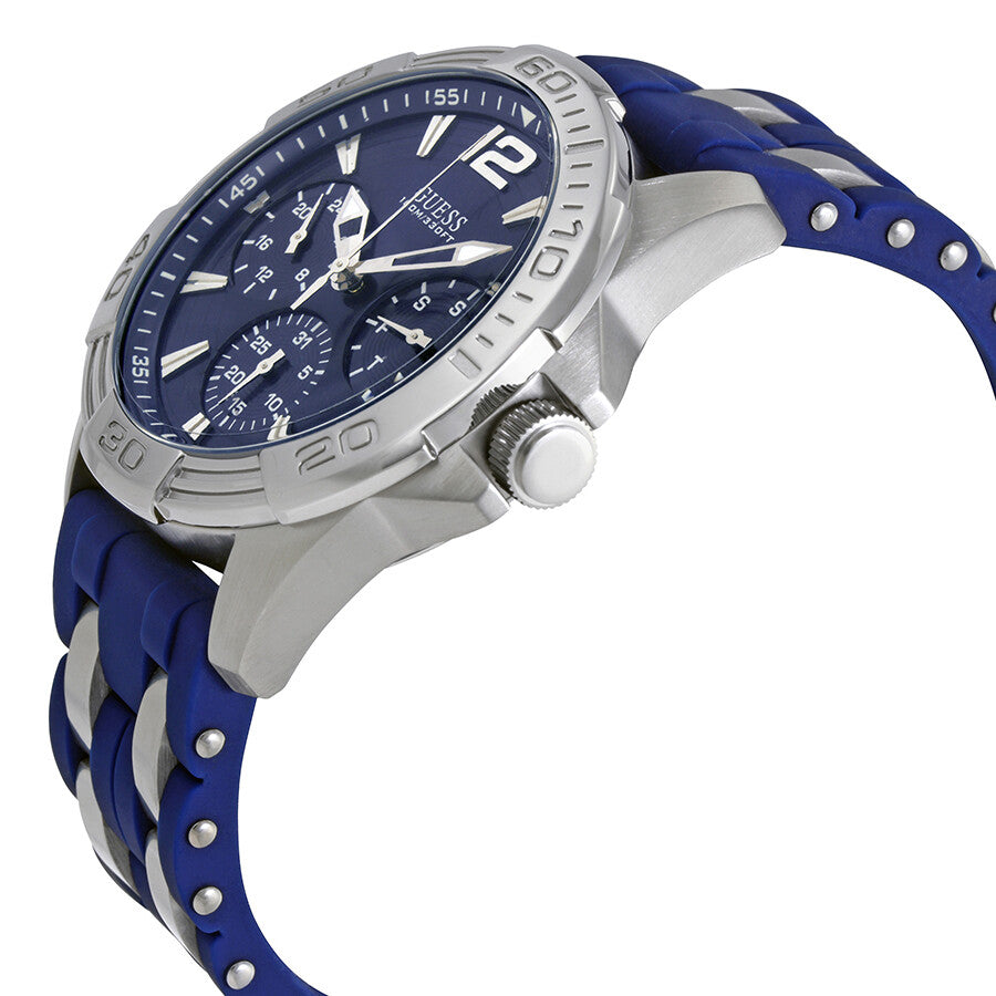 Side angle view of Guess Oasis chronograph watch showing blue and silver striped strap and profile