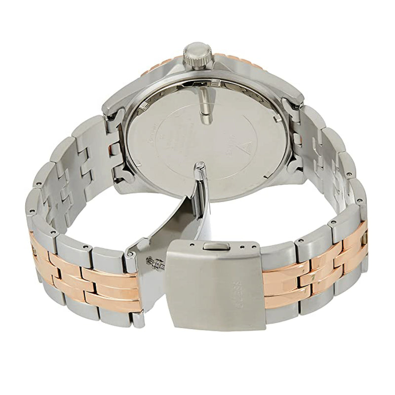 Guess Odyssey watch caseback showing steel and rose gold two-tone bracelet clasp