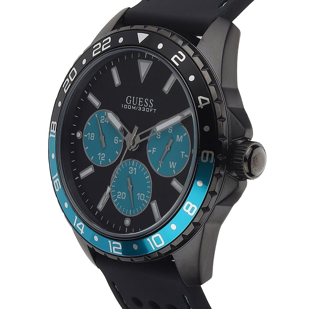 Guess Odyssey watch side angle showing black dial and blue accents with rubber strap