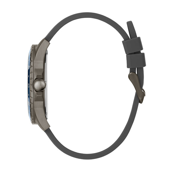 Guess Odyssey watch side profile with black rubber strap and buckle closure