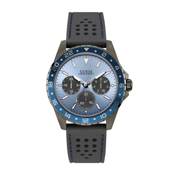 Guess Odyssey watch with light blue chronograph dial and blue bezel on dark silicon strap