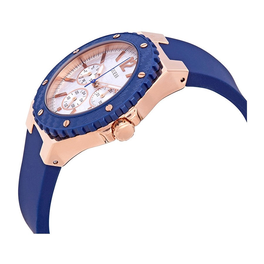 Side angle view of Guess Overdrive watch showing textured blue strap and rose gold case