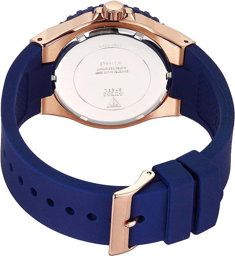 Case back of Guess Overdrive watch showing blue silicone strap and rose gold hardware