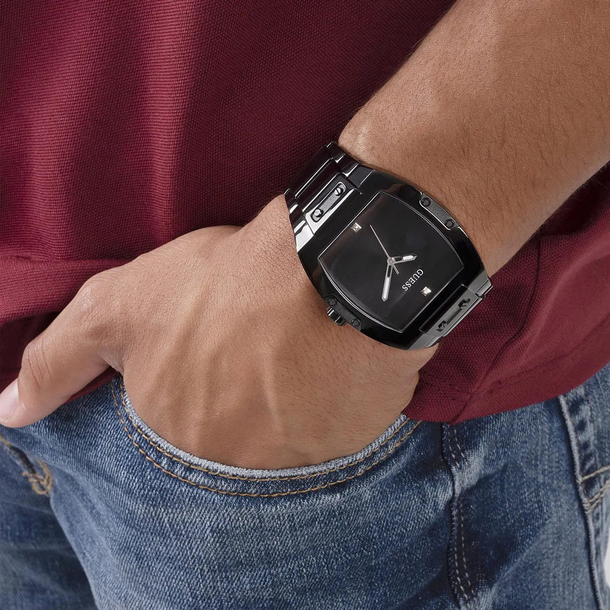 Guess Phoenix black watch on wrist showing square case and metal bracelet fit