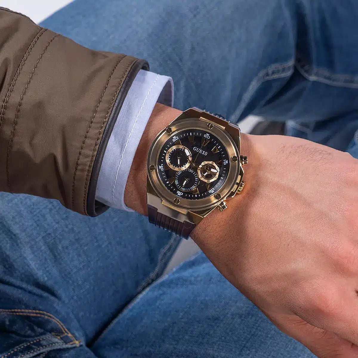 Guess Poseidon men's chronograph watch on wrist in casual outfit setting