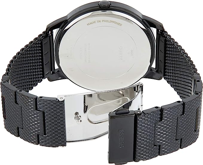 Caseback view of Guess Richmond watch showing silver case back and mesh strap