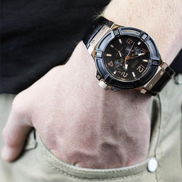 Guess Rigor watch on wrist with chronograph hands and rose gold case