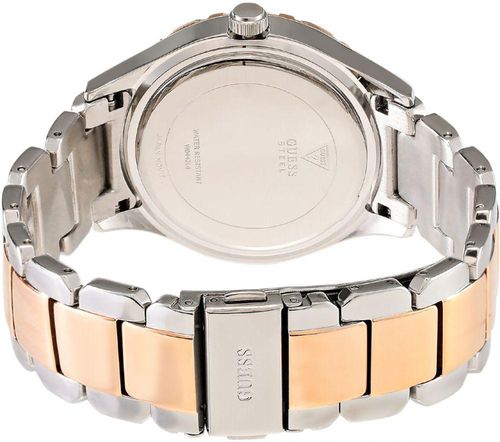 Caseback of Guess Siren watch showing stainless steel case back and two-tone bracelet