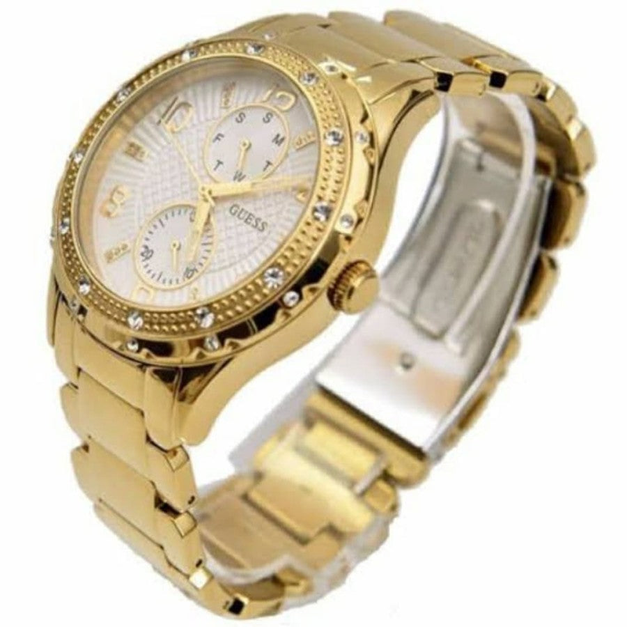 Guess Siren gold women's watch shown from side angle with full bracelet visible