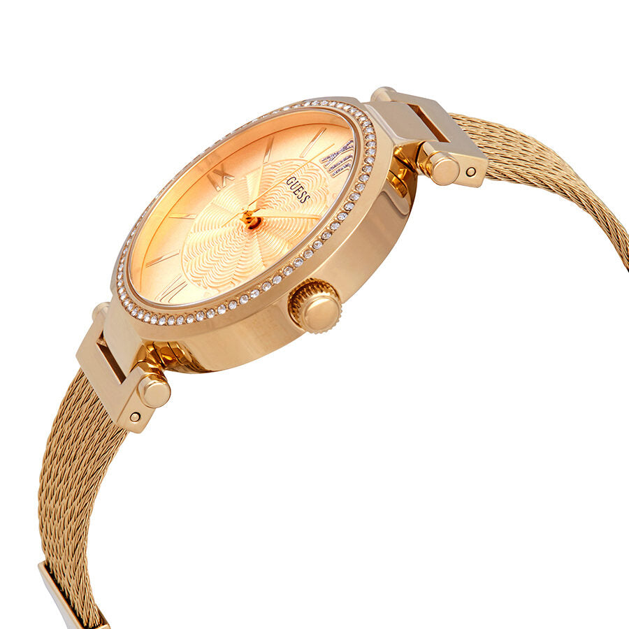 Guess Soho ladies watch side angle view showing yellow gold PVD mesh and solid bracelets