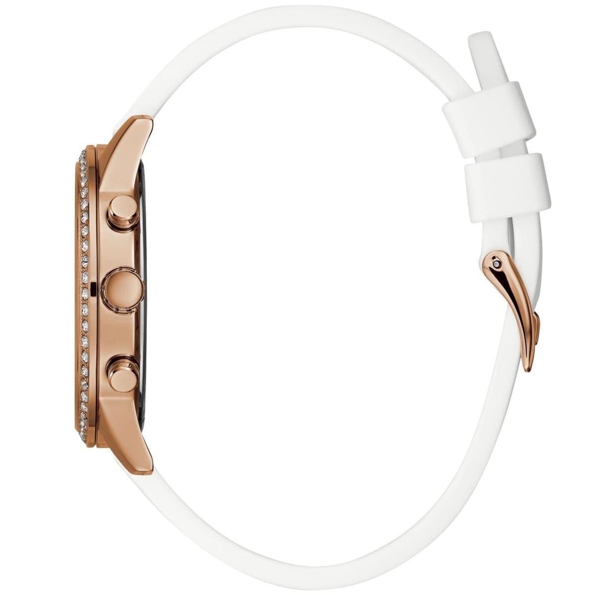 Side view of Guess Solar rose gold watch showing case thickness and white rubber strap