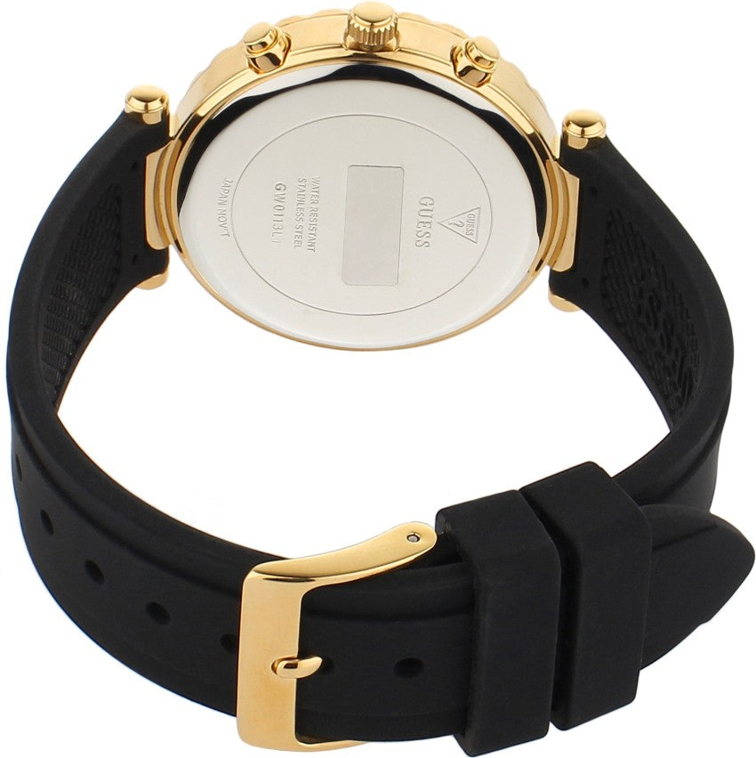 Guess Solstice watch case back showing gold-tone case with black rubber strap