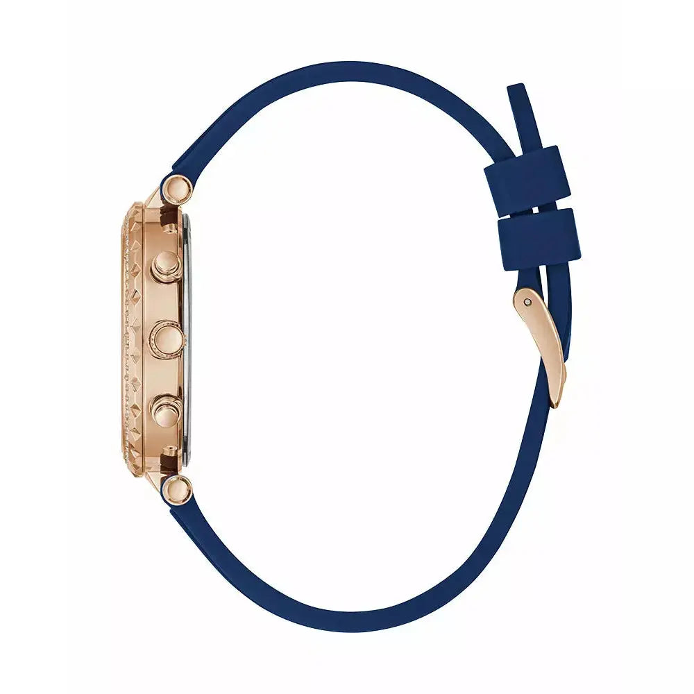 Side view of Guess Solstice rose gold watch with blue silicone strap and rose gold buckle