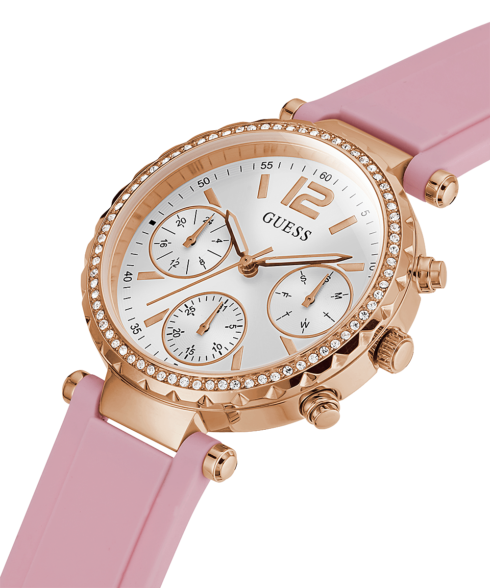 Angled view of Guess Solstice watch showing rose gold case with crystal bezel and pink strap