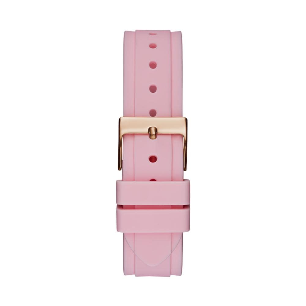 Pink silicone strap detail of Guess Solstice watch with rose gold buckle