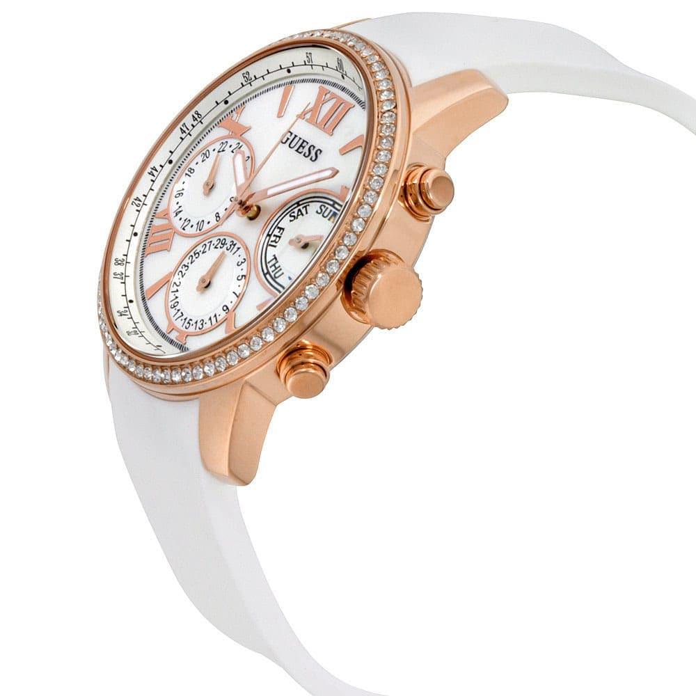 Angled view of Guess Sport rose gold chronograph watch with white silicone strap
