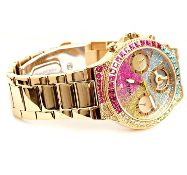 Guess Sugarrush gold women's chronograph watch with ombre dial worn on wrist