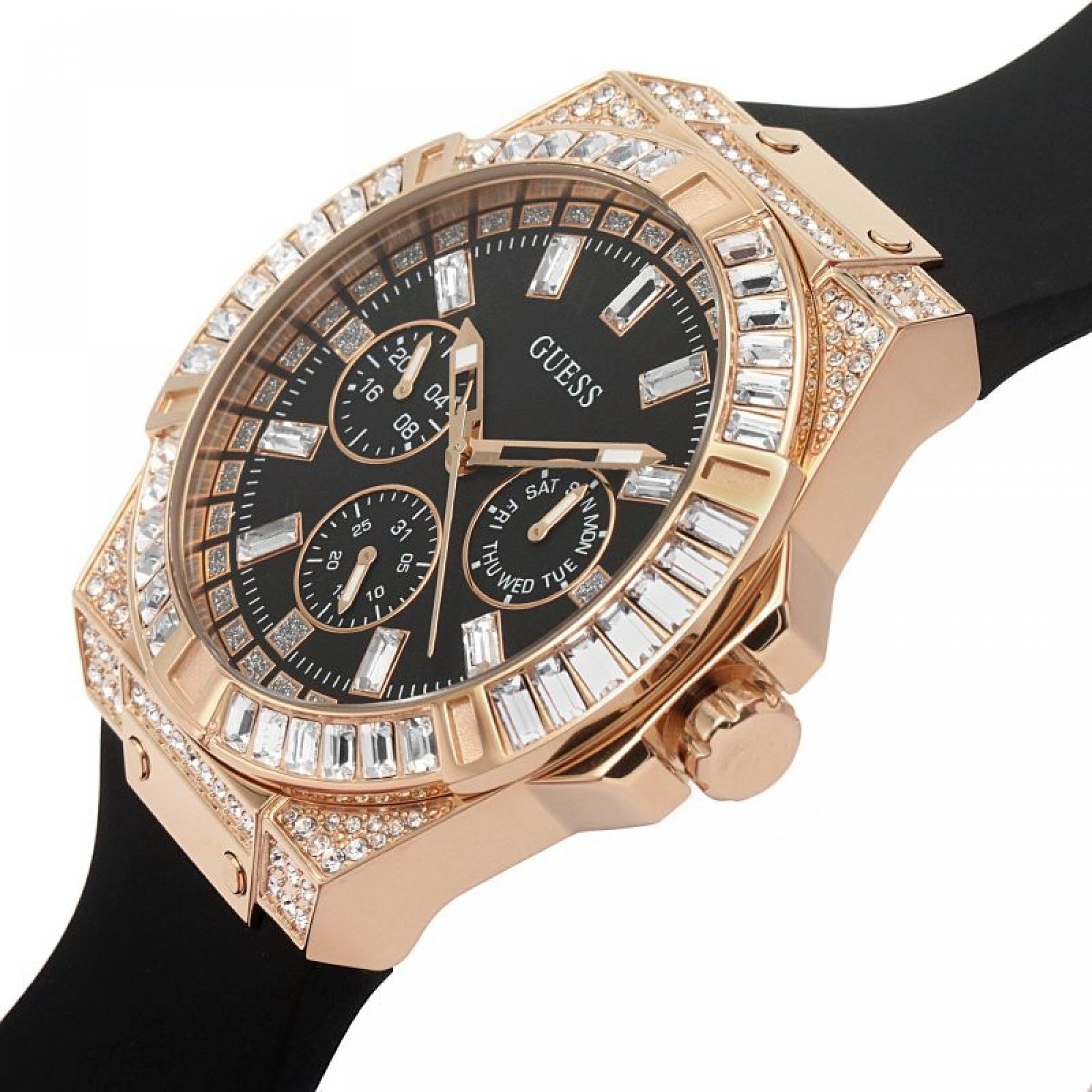 Guess Venus watch worn on wrist showing rose gold crystal-set case, black dial and black silicone strap