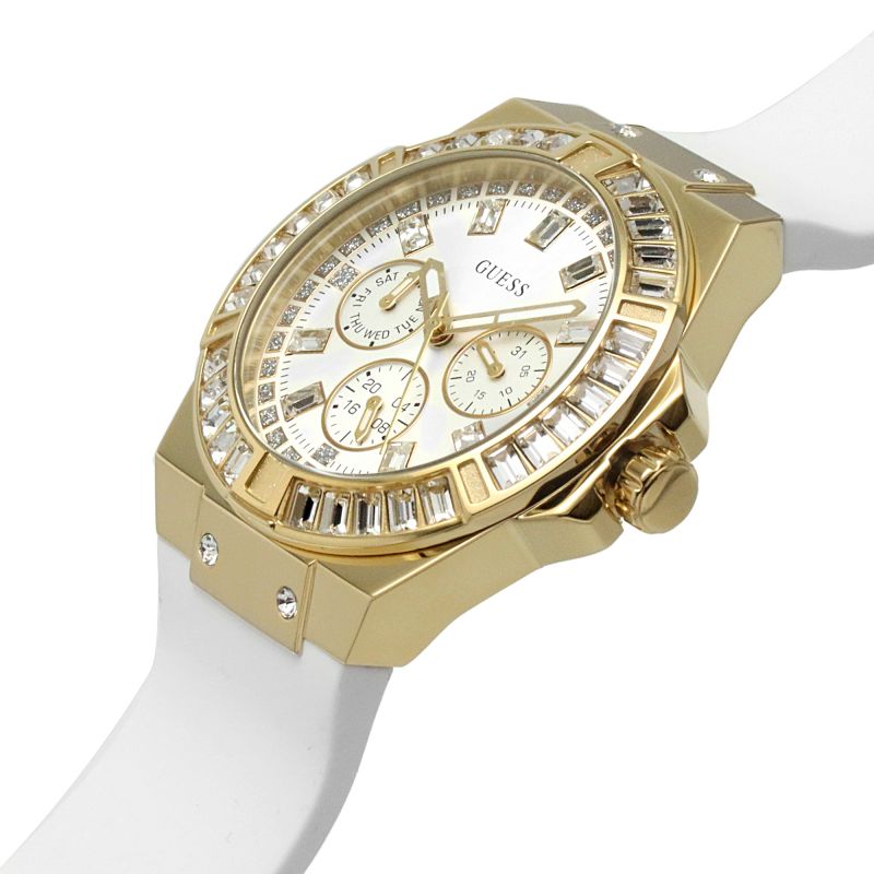 Guess Venus watch on wrist showing gold case, chronograph subdials, and white silicone band