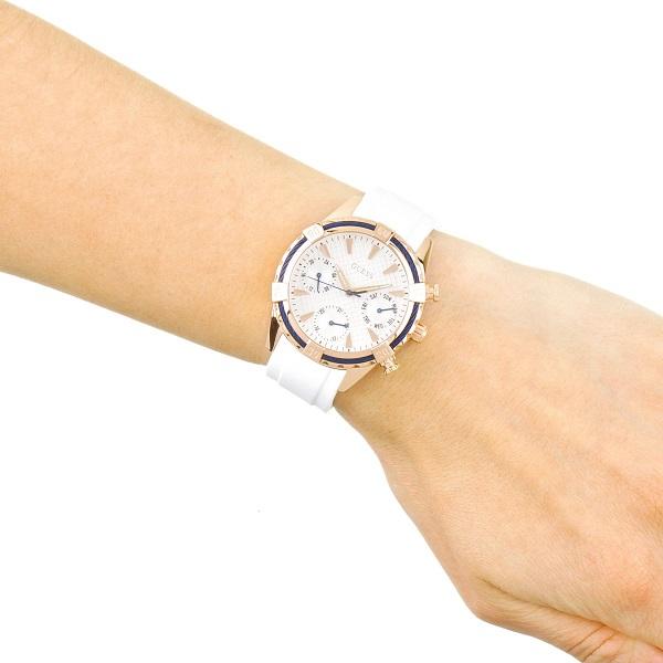 Guess W0562L1 ladies chronograph watch on wrist showing white dial and blue hands