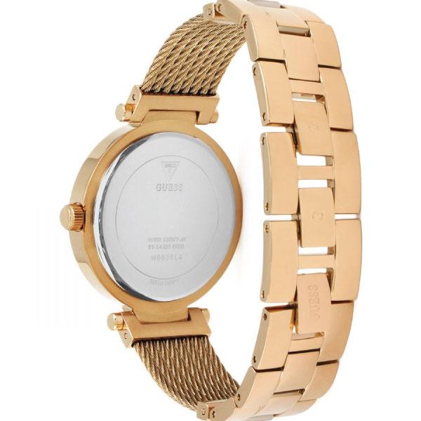 Rose gold watch with caseback visible and dual bracelet straps, side view