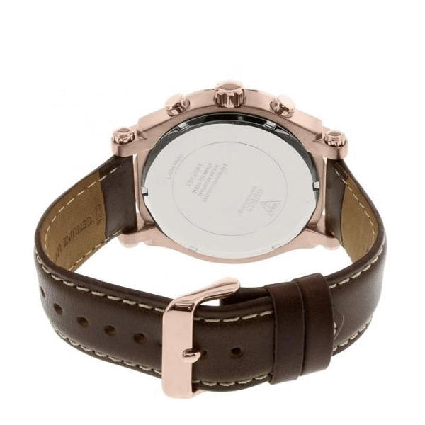 Guess W0673G3 watch caseback showing rose gold metal case and brown leather strap