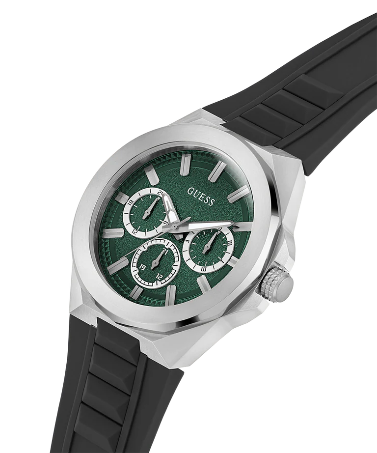 GUESS W0799G3 angled view showing silver case, green dial with subdials, and black rubber strap