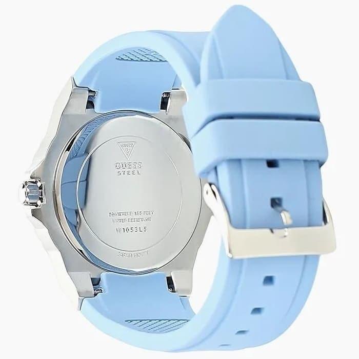 Caseback view of Guess W1053L5 watch with blue rubber strap and engraved details visible
