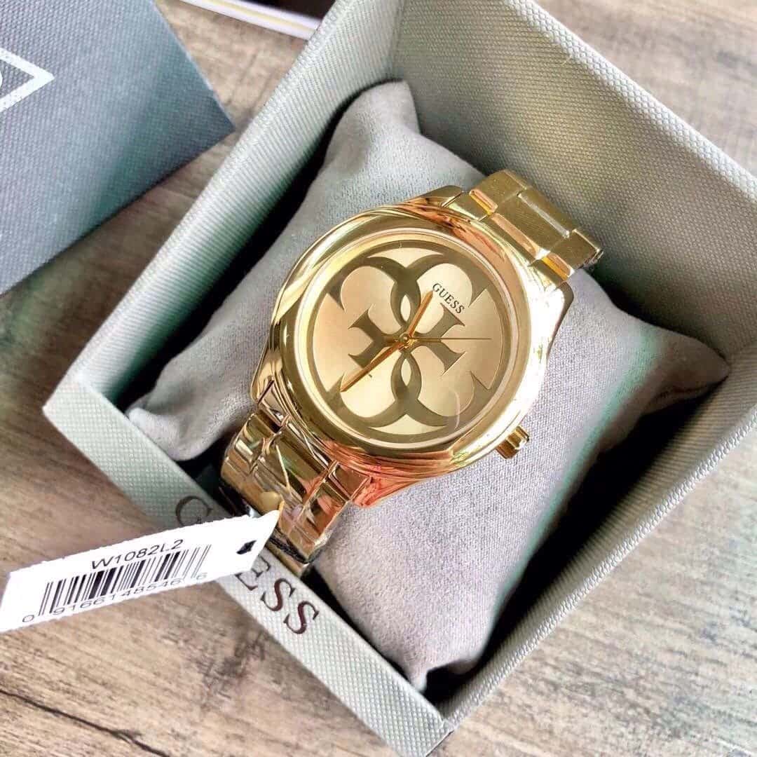 Guess W1082L2 gold watch in original Guess presentation box with tissue