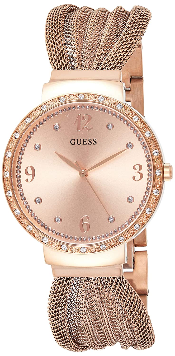 Guess W1083L3 rose gold women's watch with mesh strap and crystal bezel on wrist