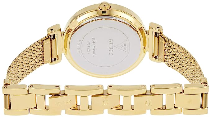 Gold watch caseback showing engraved Guess branding and mesh strap