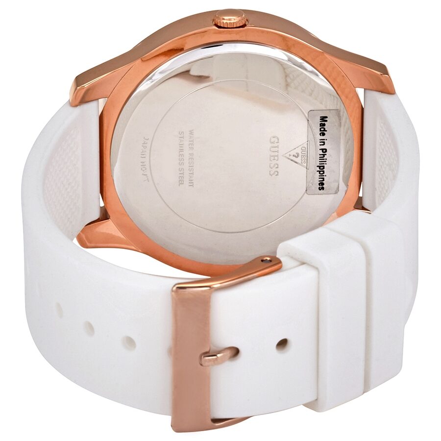 Guess W1223L3 caseback view showing stainless steel back with Made in Philippines marking and white strap