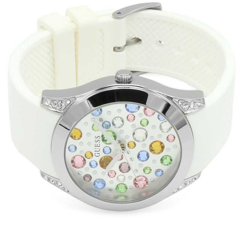 Guess Wanderlust Crystals watch at angle showing silver case with crystal-adorned lugs and white strap