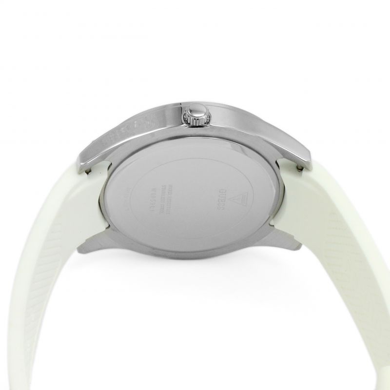 Caseback of Guess Wanderlust Crystals watch showing brushed silver case back and lugs