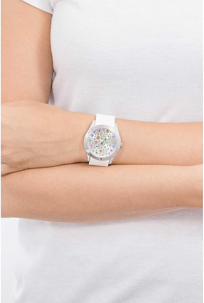 Guess Wanderlust Crystals watch worn on wrist with silver dial and multicolored crystals visible