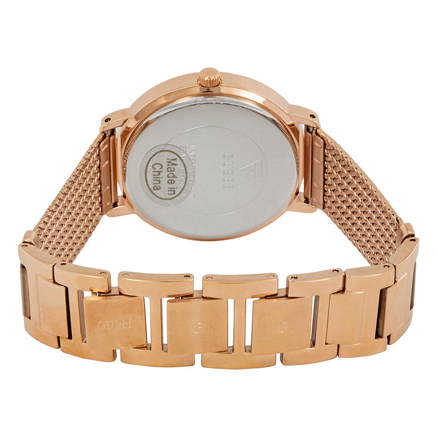 Guess Willow caseback showing rose gold PVD case and mesh bracelet construction