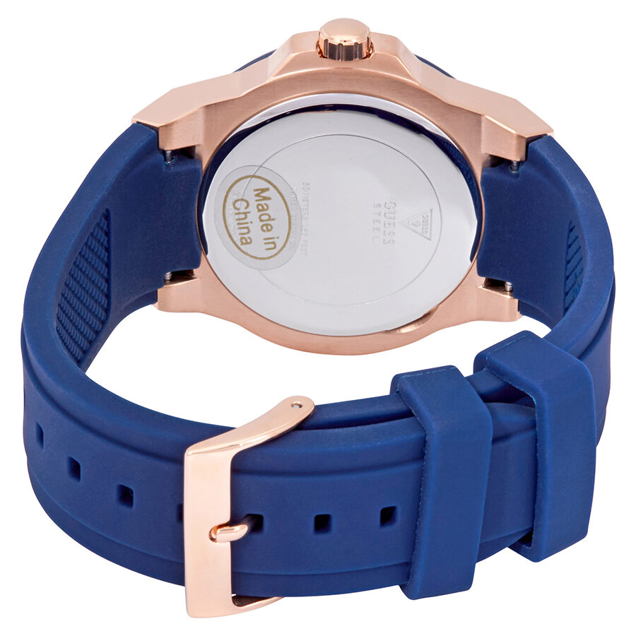 Guess Zena watch caseback showing Guess branding and blue silicone strap attachment