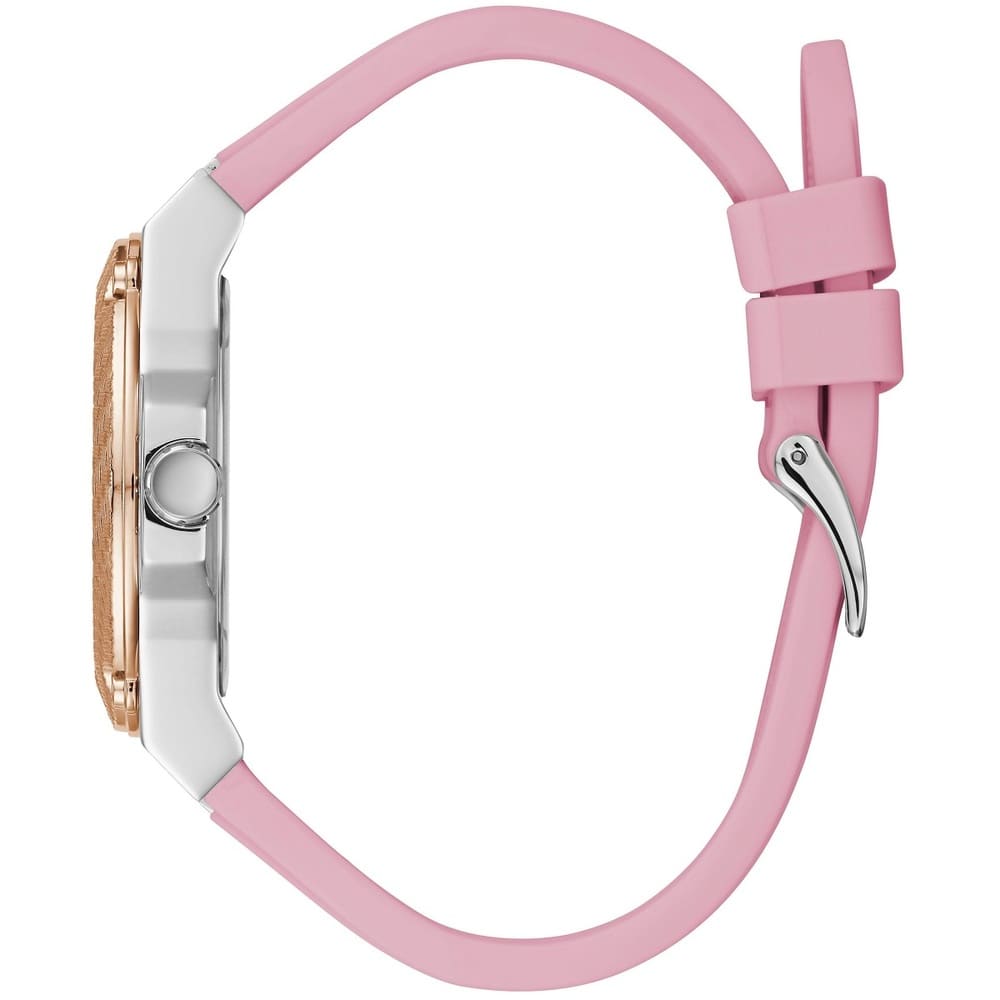 Side view of Guess Zena watch showing rose gold case, white dial, and pink silicone strap with buckle