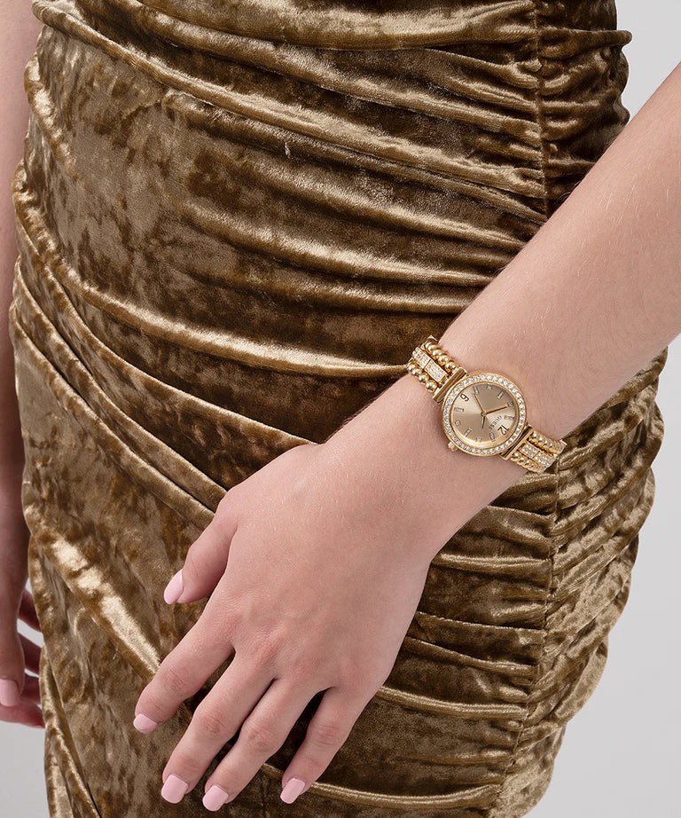 GUESS GW0401L2 gold tone watch worn on wrist showing size and fit