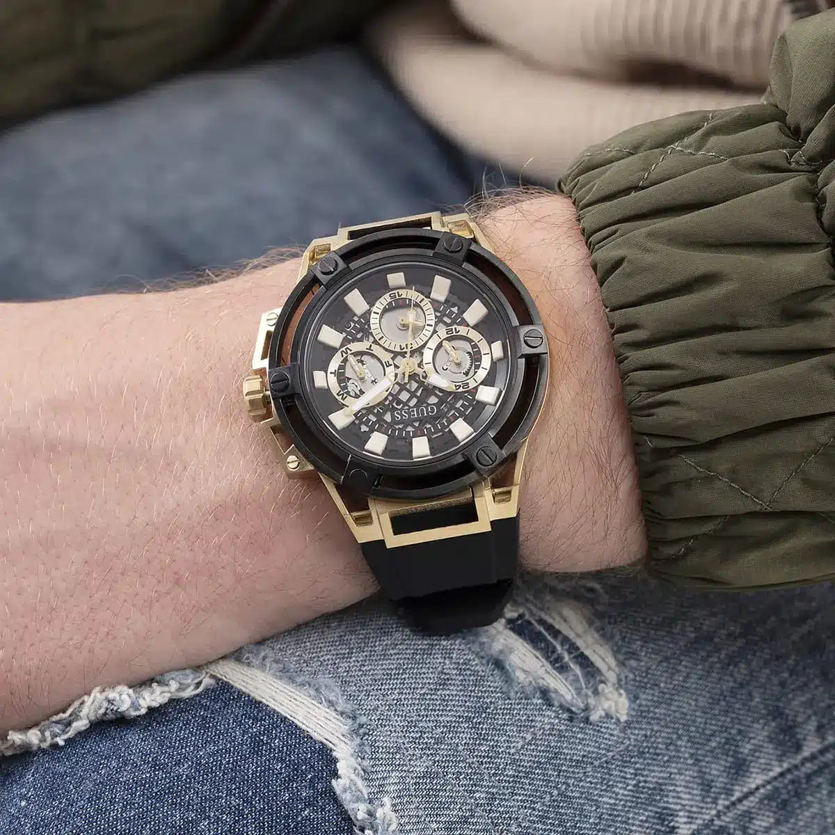 Guess Matrix men's multifunction watch on wrist displaying chronograph subdials