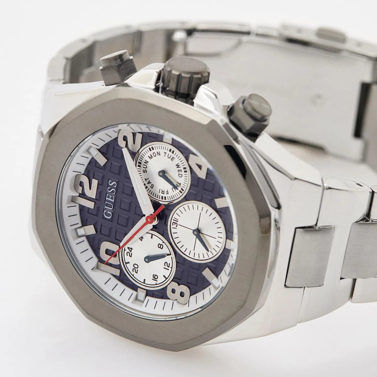 Close-up of Guess Legacy Chronograph blue dial with chronograph subdials and hands